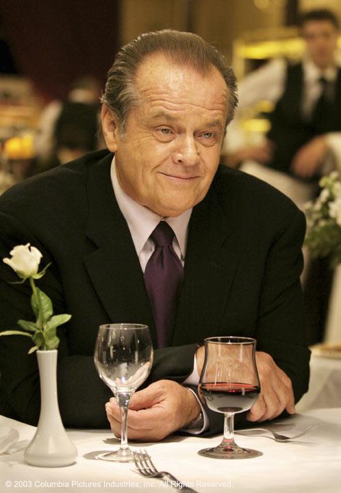 Filmscène Something's Gotta Give met Jack Nicholson glimlachend aan restauranttafel