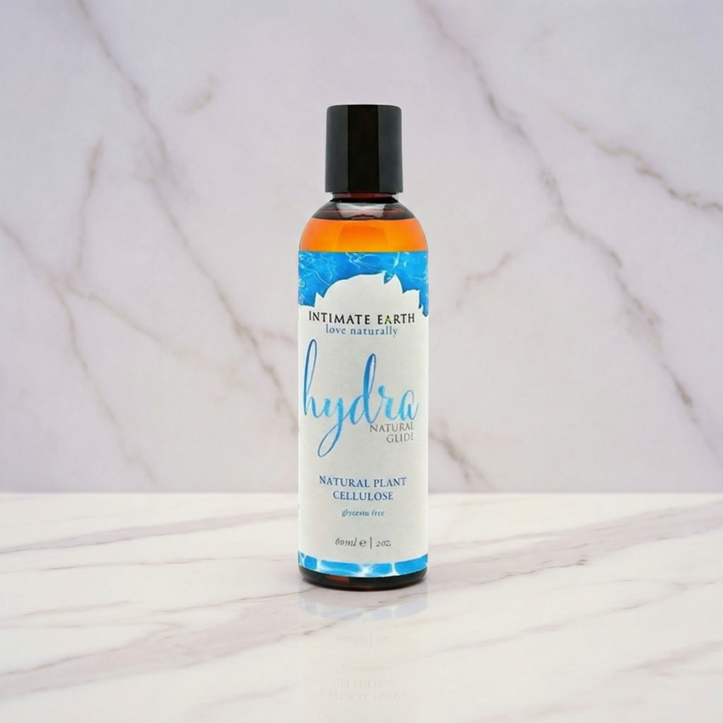 Intimate Earth Hydra Natural Glide amberkleurige fles glijmiddel op waterbasis 60 ml zwarte dop