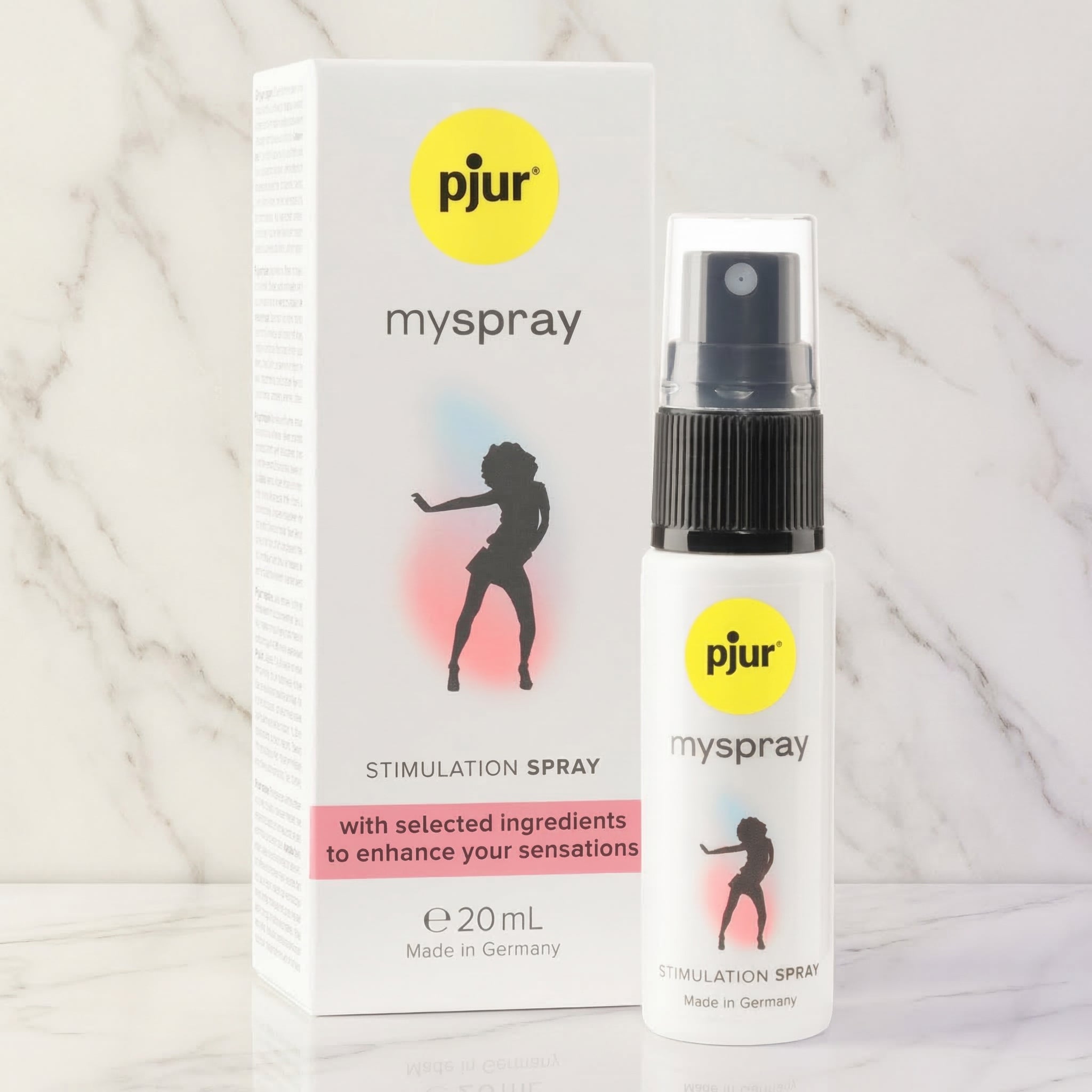 Pjur MySpray stimulatiespray voor vrouwen 20 ml, wit flesje met zwarte verstuiver op marmeren achtergrond